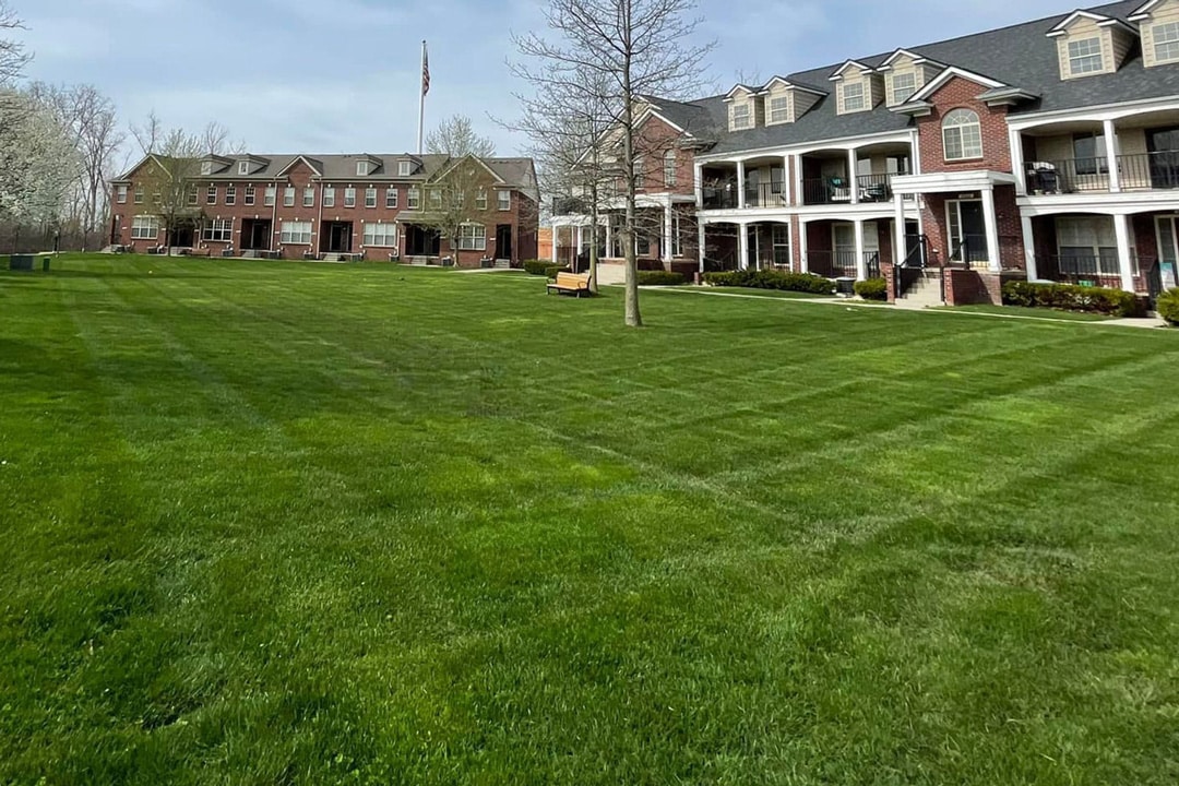 A perfectly manicured commercial lawn and grounds by J & J Landscaping in Metro Detroit