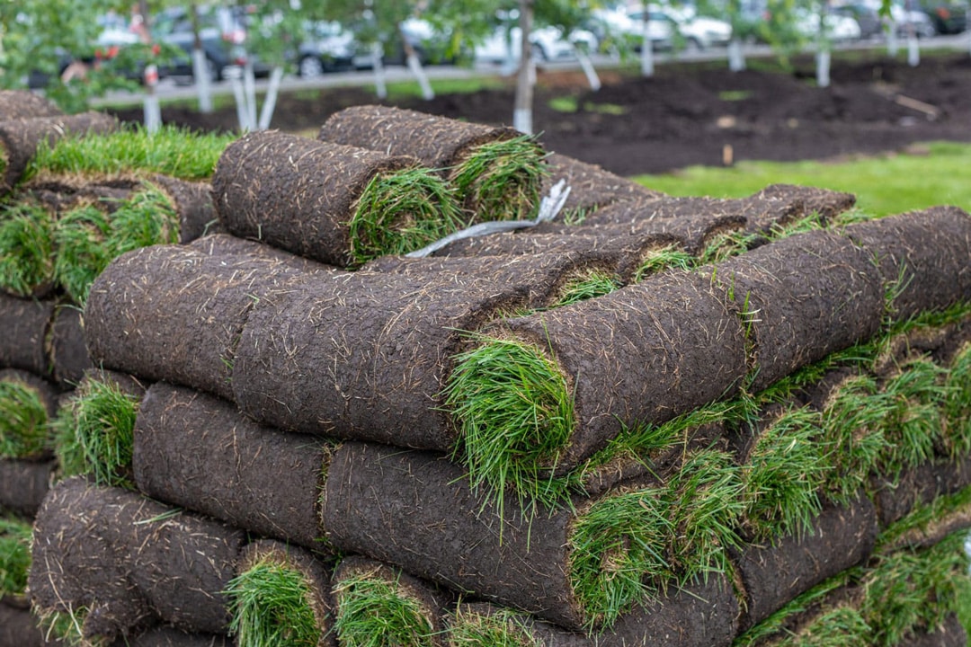 Stacks of fresh sod ready to be installed by J & J Landscaping