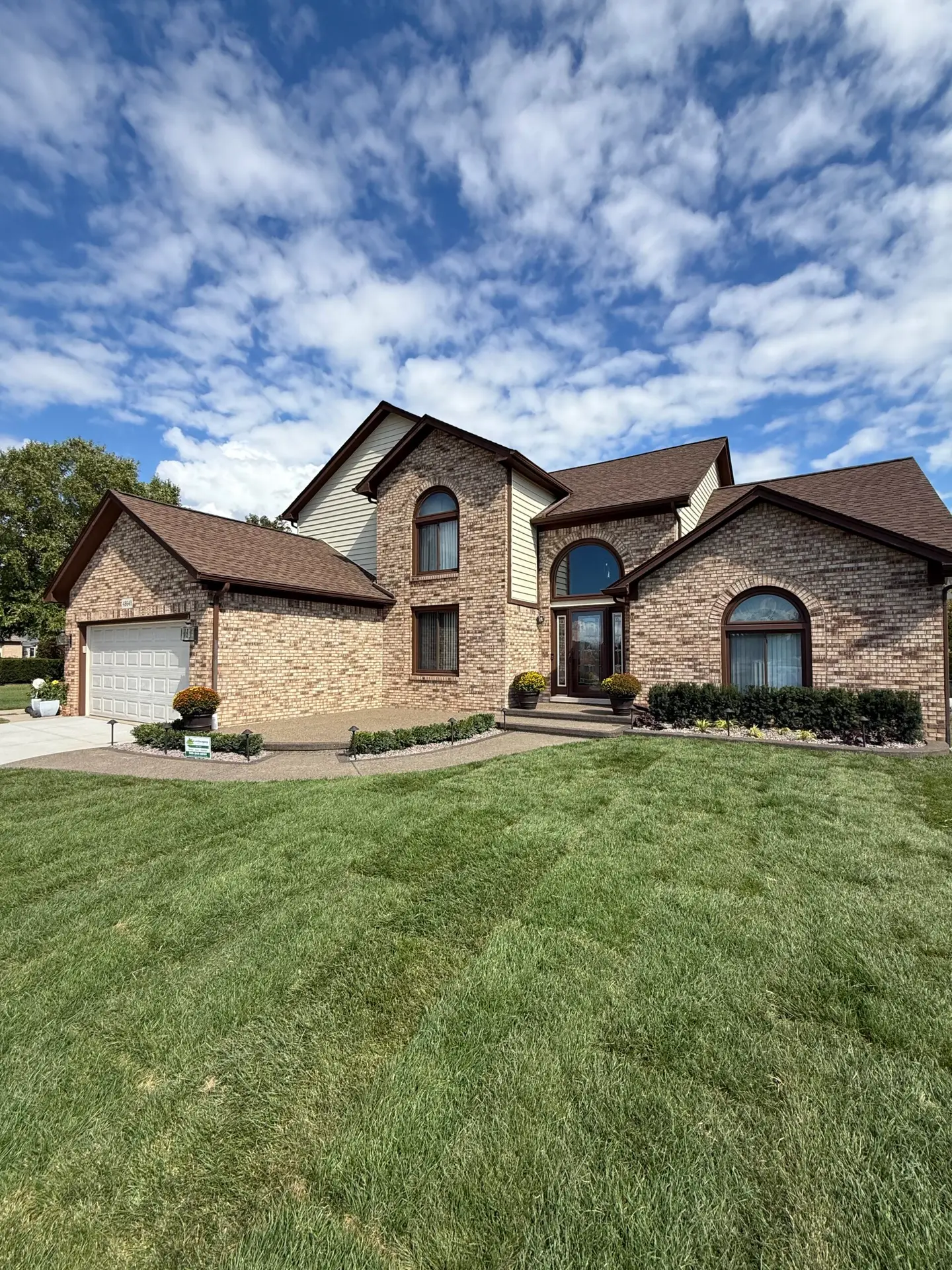 A Complete Hardscape and Landscape renovation designed and built by J & J Landscaping LLC at a client's residential home in Macomb, Michigan.