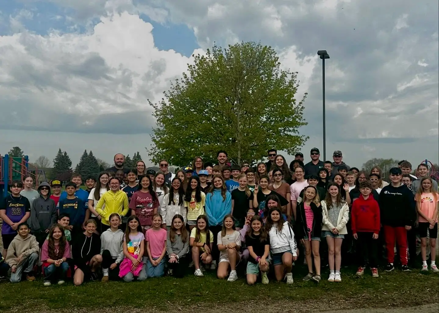 Arbor Day 2026. 5th Grade Students at Mohawk Elementary, standing with the tree the helped plant!