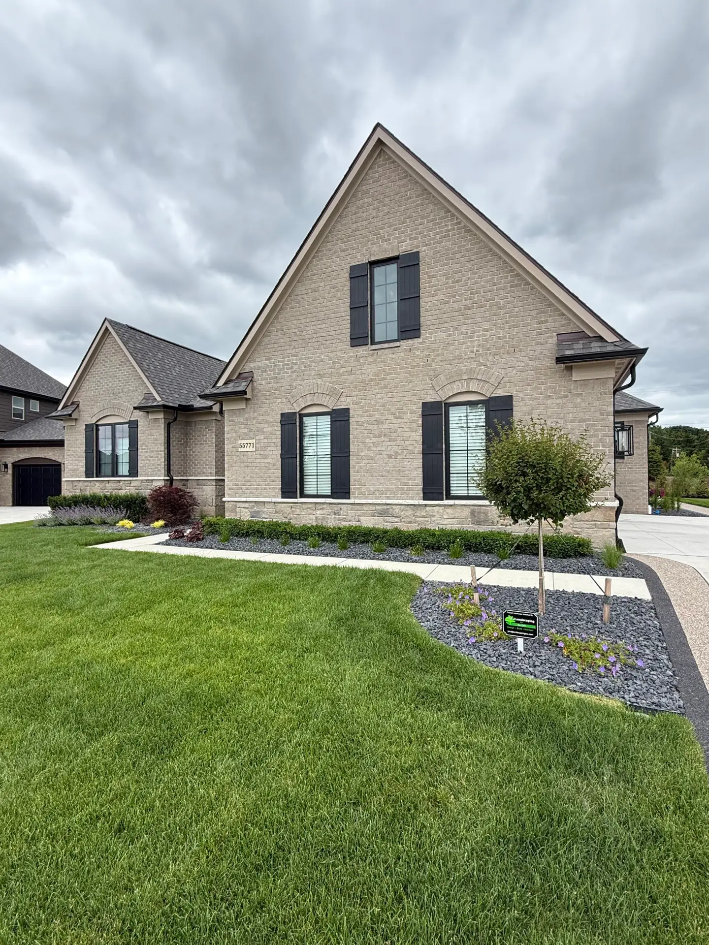 A front landscape installation for a home designed by J & J Landscaping in Macomb, Michigan.