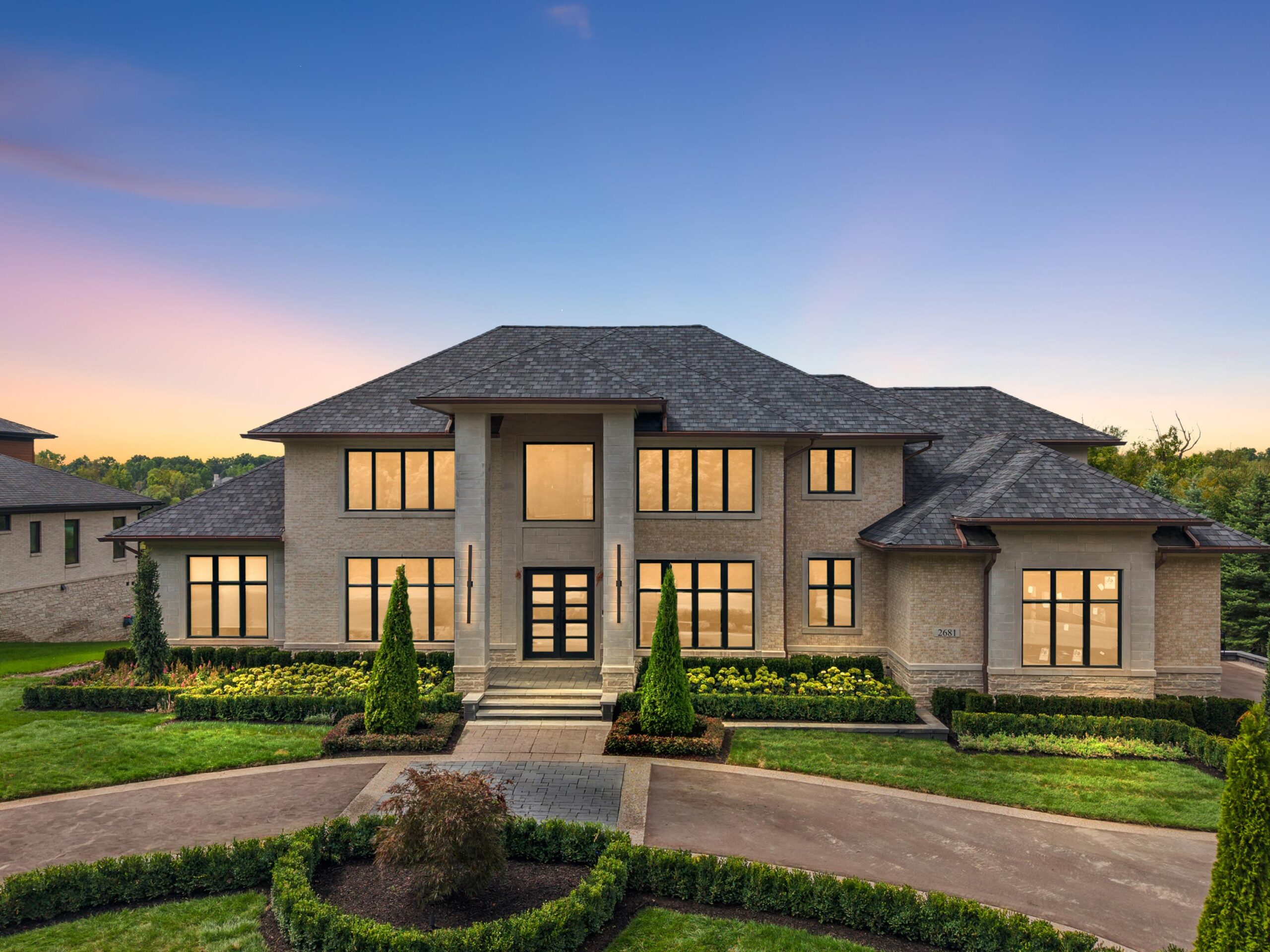 A beautiful home with landscape done by J&J Landscaping. In Bloomfield Hills, Michigan.